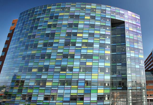 Johns Hopkins Children's Center exterior view of multicolored, glass building.